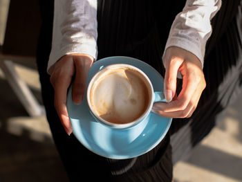 Midsection of coffee cup