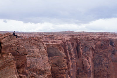 Scenic view of rock formations against sky