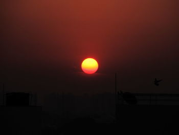 Scenic view of dramatic sky during sunset