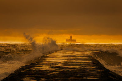 Scenic view of sea during sunset