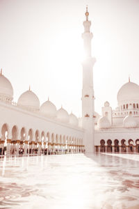 View of mosque against sky in city