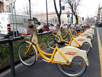 Bicycle parked on road in city