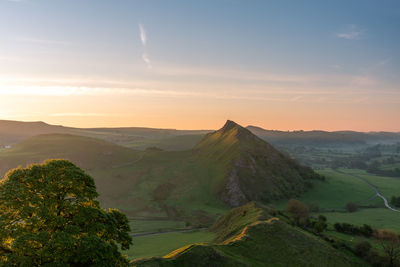 Scenic view of landscape against sky during sunset