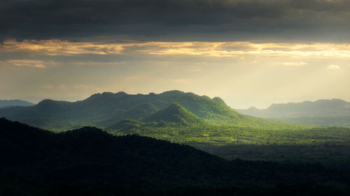 Scenic view of landscape against sky during sunset