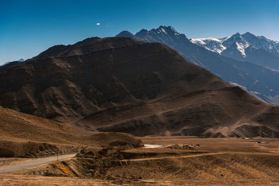 Scenic view of mountains against clear sky