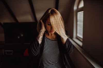 Attractive young girl posing in her room. morning concept.