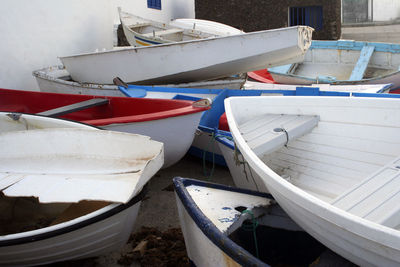 High angle view of boats moored at shore