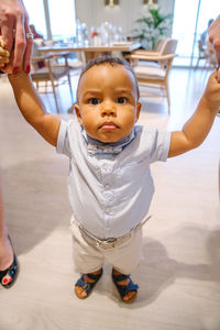 Cure mixed race baby boy portrait