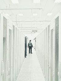 Man standing on corridor