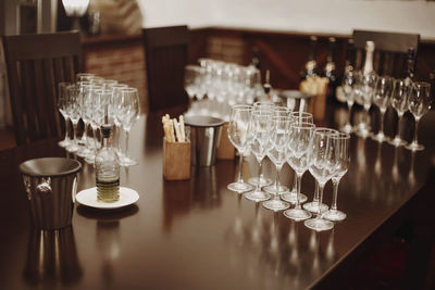Row of wine glasses on table