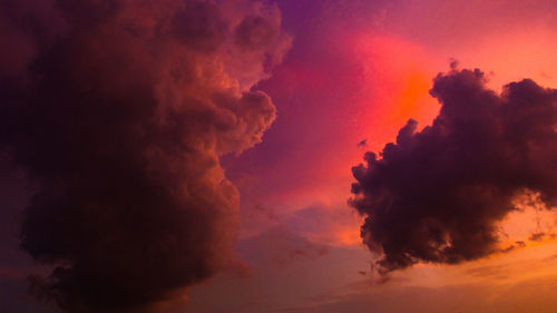 Low angle view of dramatic sky during sunset