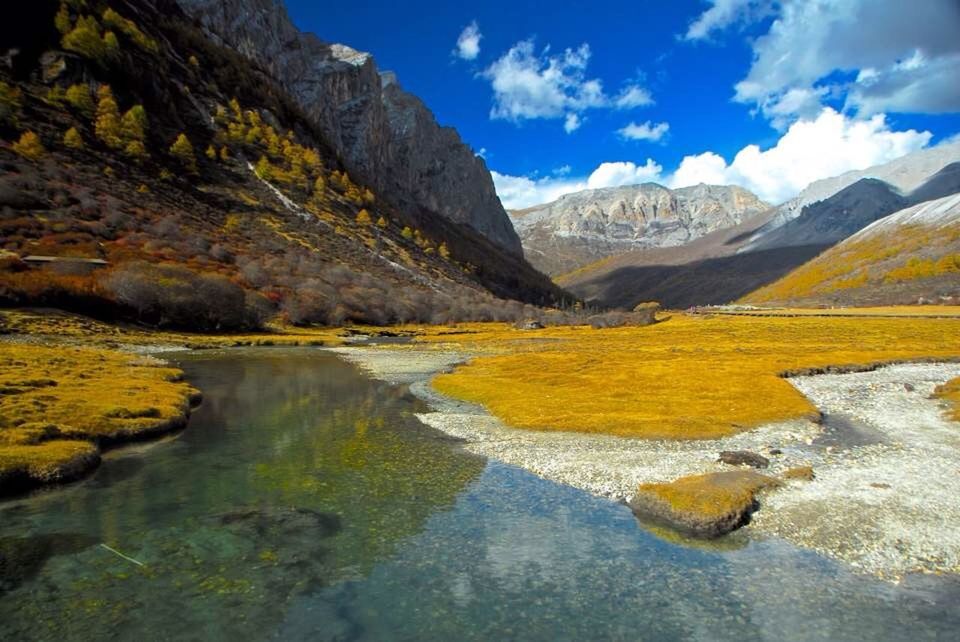 mountain, water, mountain range, scenics, tranquil scene, beauty in nature, tranquility, sky, lake, nature, rock - object, snow, idyllic, cold temperature, winter, non-urban scene, rock formation, cloud - sky, river, snowcapped mountain