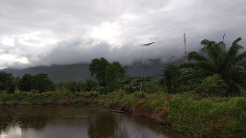 Scenic view of river against sky