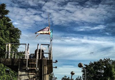 Low angle view of flag against sky