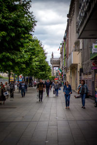 People walking on city street