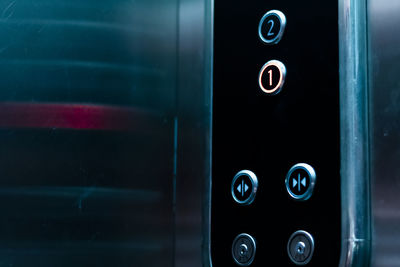 Close-up of text on metal door