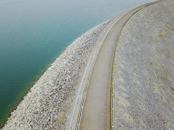 High angle view of road amidst water