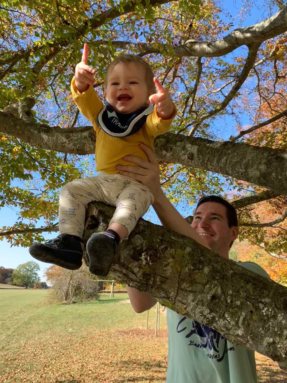 child, childhood, emotion, happiness, full length, tree, boys, real people, smiling, plant, casual clothing, two people, togetherness, leisure activity, looking at camera, family, males, men, portrait, day, innocence, positive emotion, outdoors