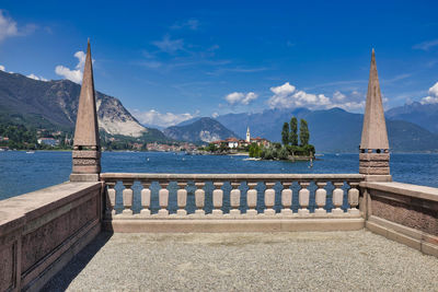 Scenic view of sea against mountain range