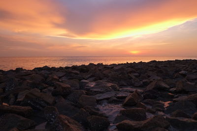 Scenic view of sea against sky during sunset