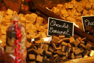 Close-up of chocolate caramels at store for sale