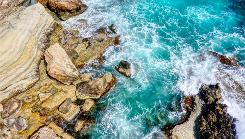 High angle view of rocks on beach