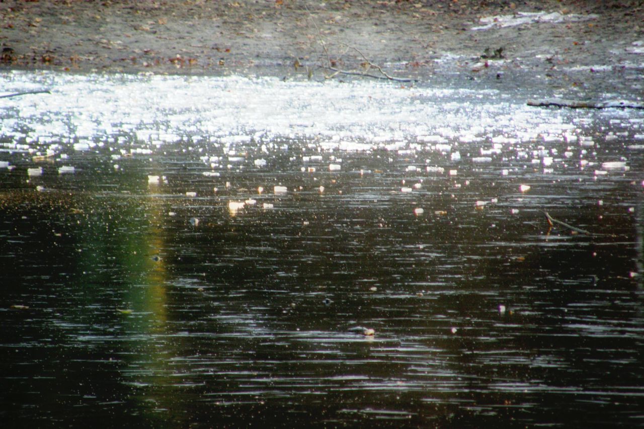 CLOSE-UP OF WET WINDOW DURING RAINY SEASON