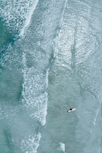 High angle view of people in sea