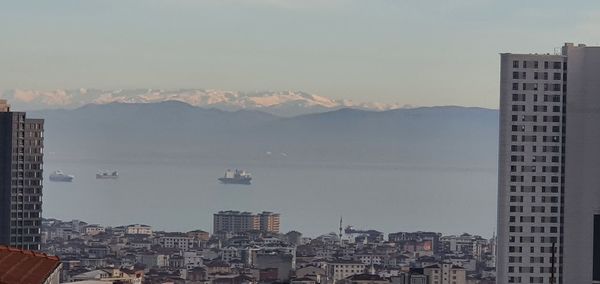 Buildings in city against sky