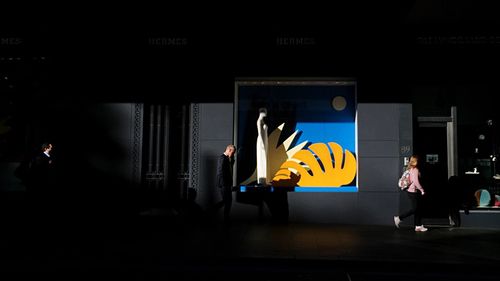 Woman standing in city