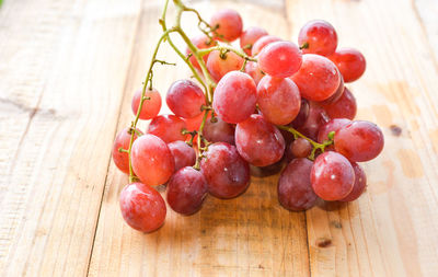 Close-up of grapes on table