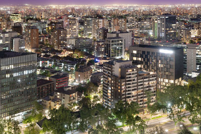 Elevated view of providencia district at night in santiago de chile