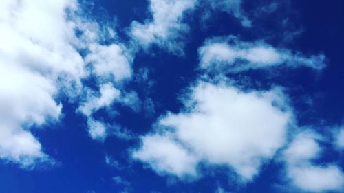 Low angle view of clouds in blue sky