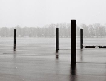 Scenic view of landscape against sky during winter