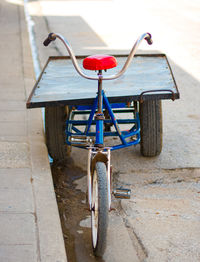 Delivery tricycle with a tray.