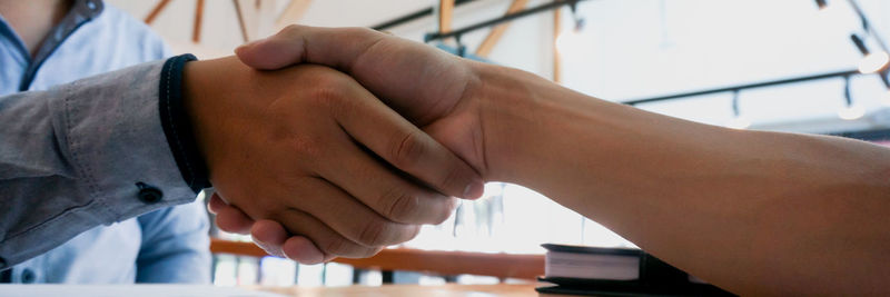 Close-up of man hands on table