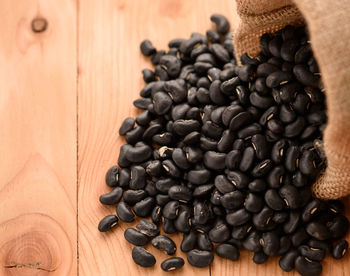 Close-up of coffee beans on table