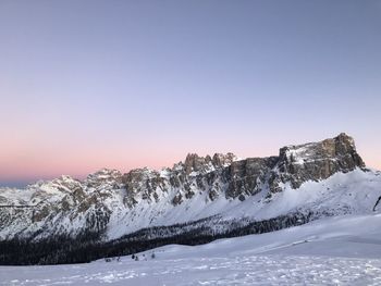 Scenic view of snowcapped mountain against sky during winter