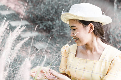 Happy woman enjoying the beautiful nature around her - woman concept and healthy natural lifestyle 