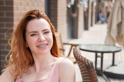 Portrait of young woman looking away