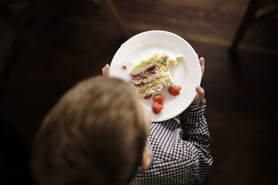 Close-up of boy cake