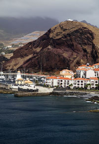 Town with mountain range in background