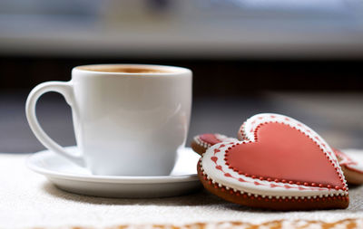 Close-up of coffee cup on table