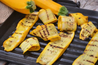 High angle view of fruits on barbecue grill