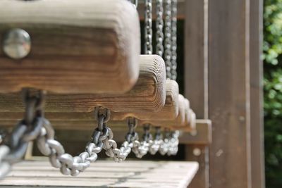 Close-up of old metal grate on table