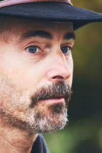 Close-up portrait of man wearing sunglasses