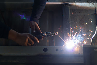 Welder, welding automotive part in a car factory