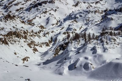 Snow covered land and mountains