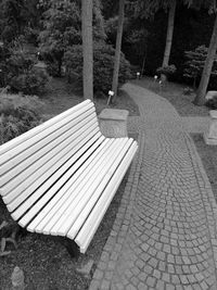 High angle view of bench in park
