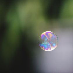 Close-up of rainbow over bubbles